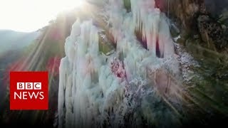 Frozen waterfalls form on Chinas Tianmen Mountain  BBC News [upl. by Einitsed819]