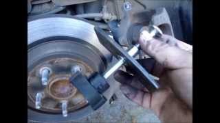 2005 Ford Freestar Rear Brake Pad Replacement [upl. by Ediva385]