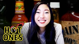 Awkwafina Gets Hot and Cold While Eating Spicy Wings  Hot Ones [upl. by Crudden745]