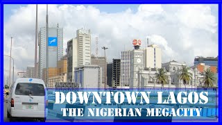 Downtown LAGOS NIGERIA  Discover the African megacity  From Balogun market to VI Ikoyi and Lekki [upl. by Orutra926]