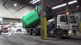 Emptying Gradeall Hook Lift Portable Waste Compactor [upl. by Nirrek849]